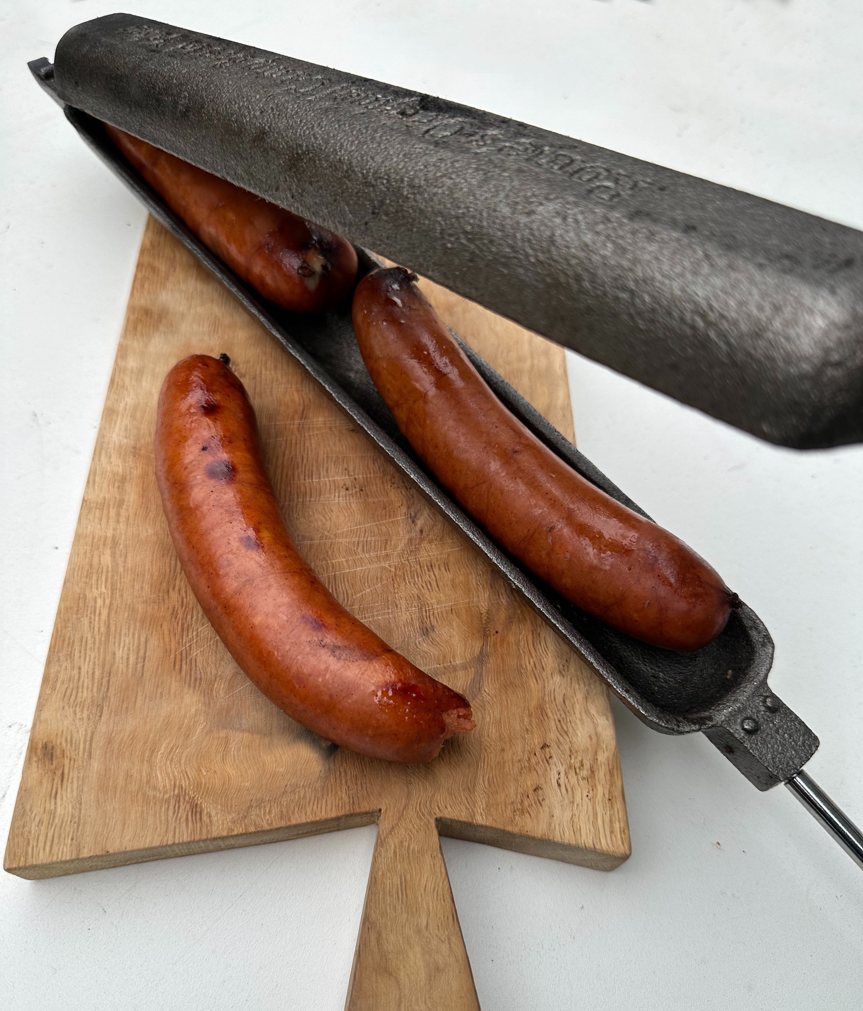 Rome Has Two Cast Iron Cookers For Sausages and Brats