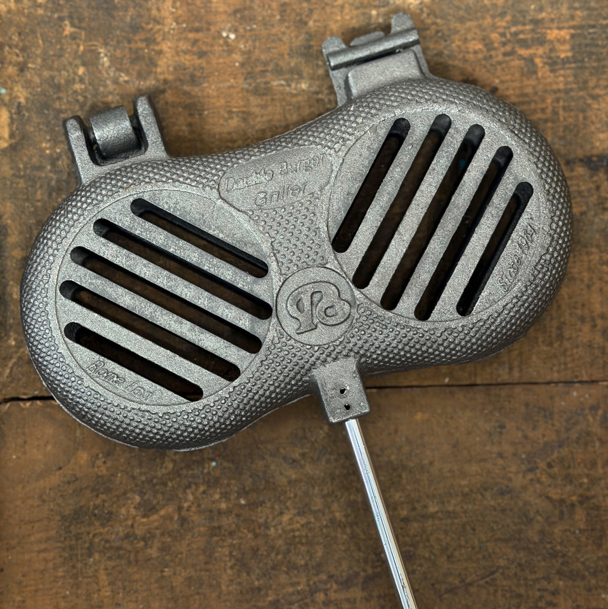 Rome Double Burger Griller cooking head close up wood background