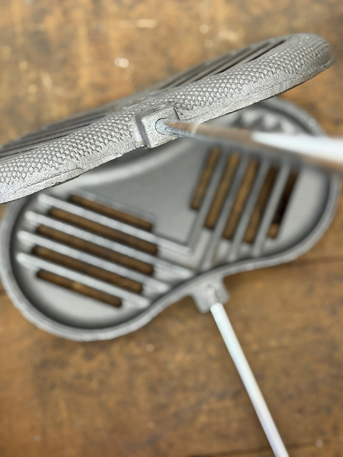 Cast Iron Double Burger Griller open view wood background