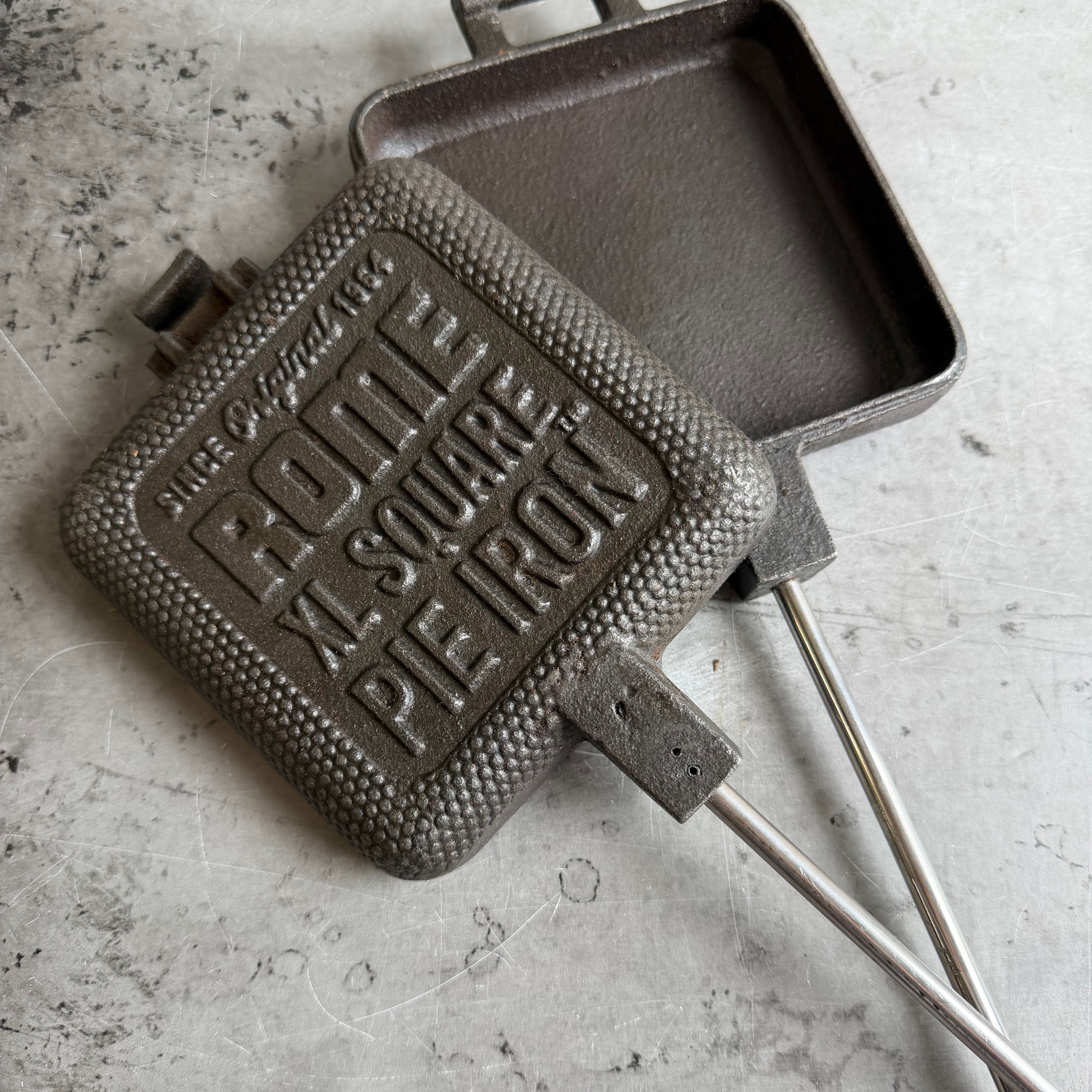 XL Square Pie Iron unhinged close up view gray background