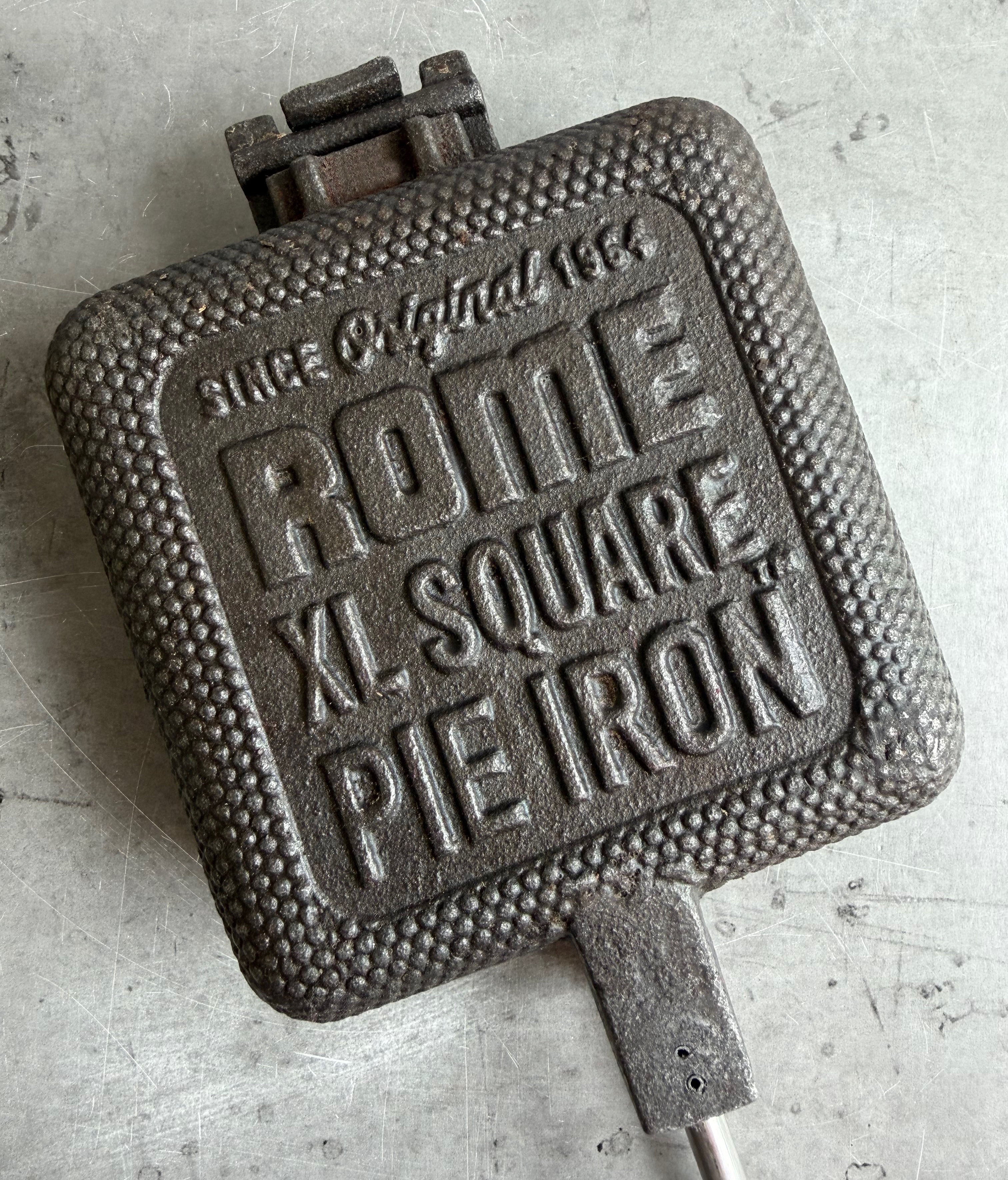 XL Square Pie Iron cooking head close up gray background