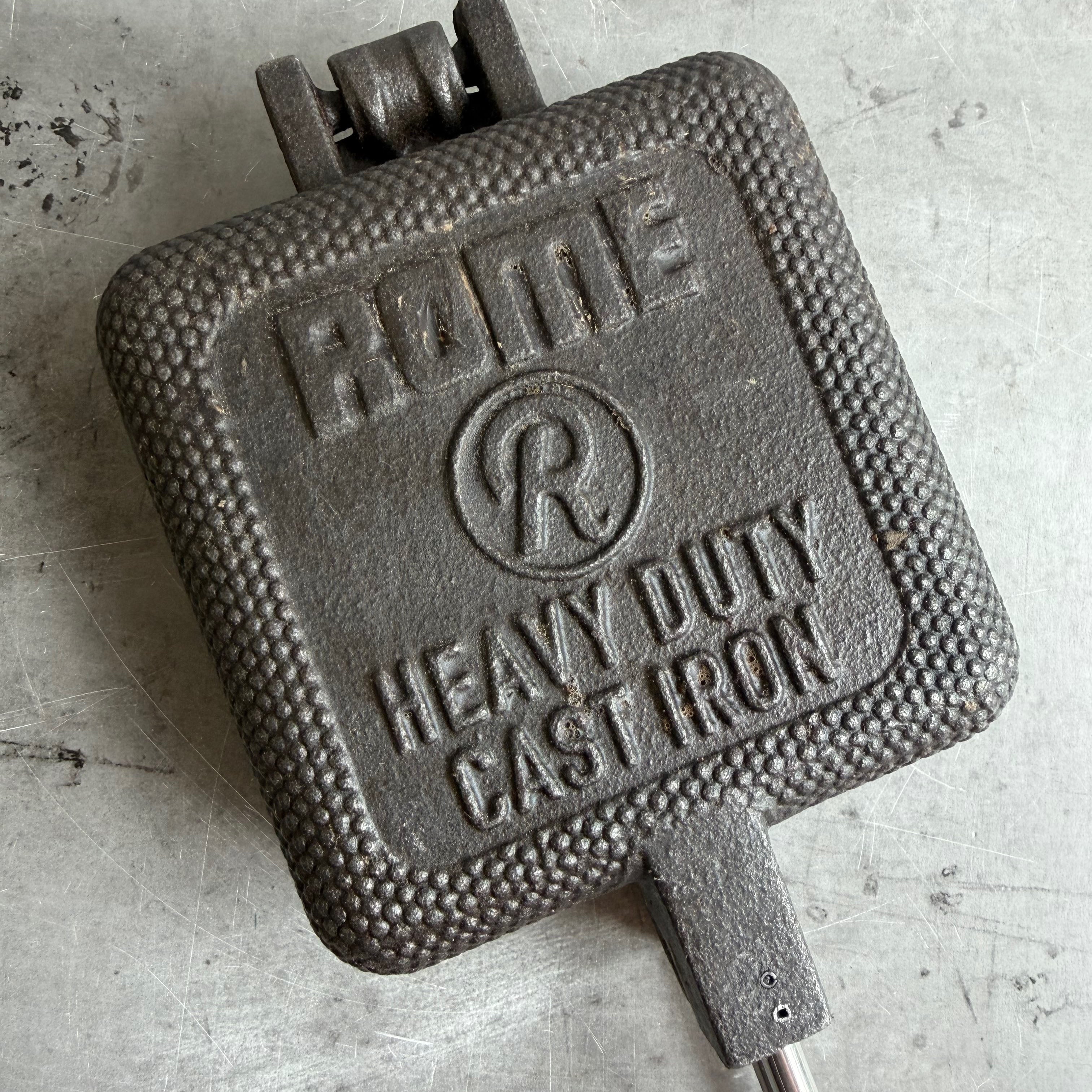 XL Square Pie Iron cooking head close up gray background b