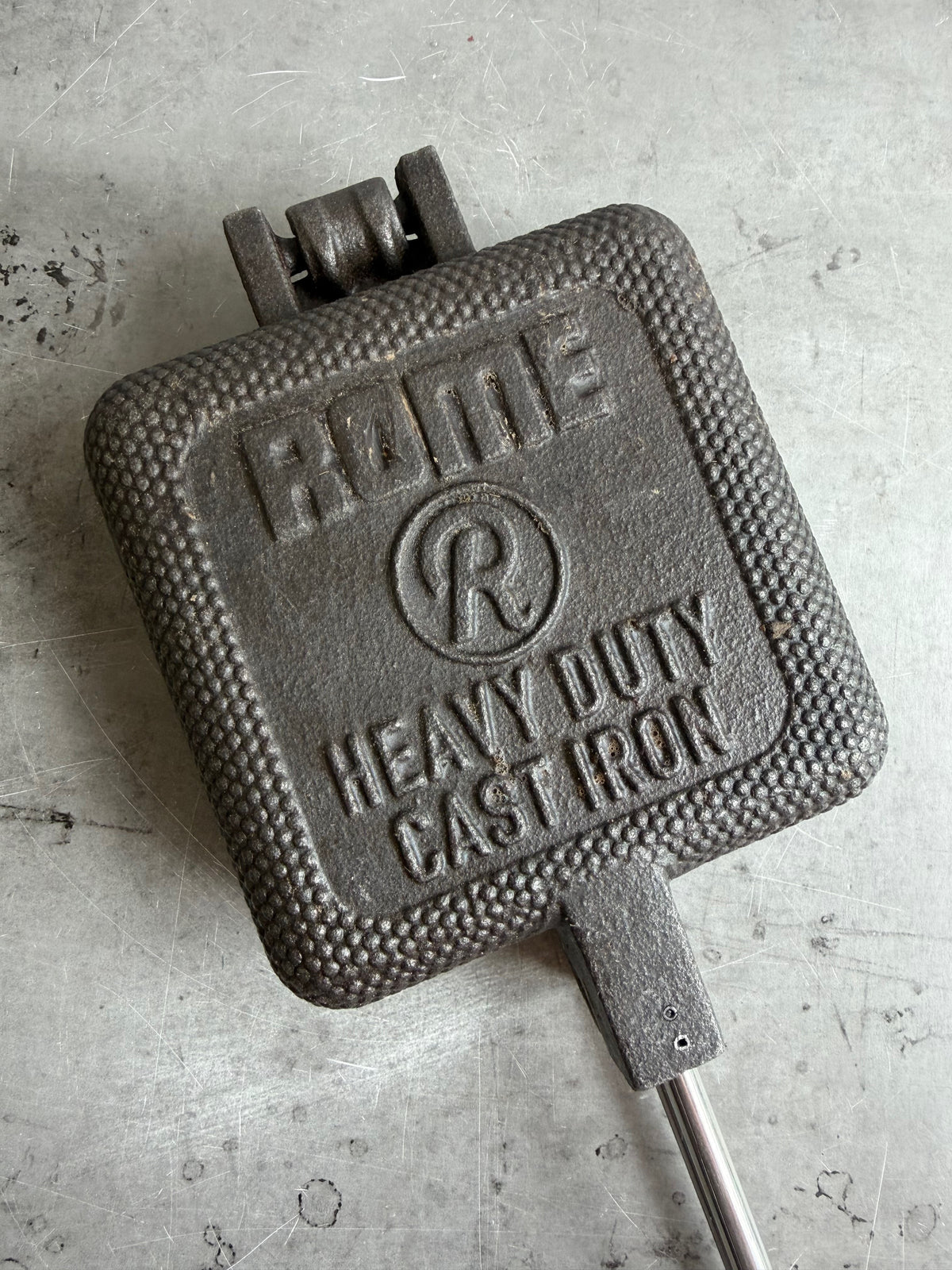 XL Square Pie Iron cooking head close up gray background b