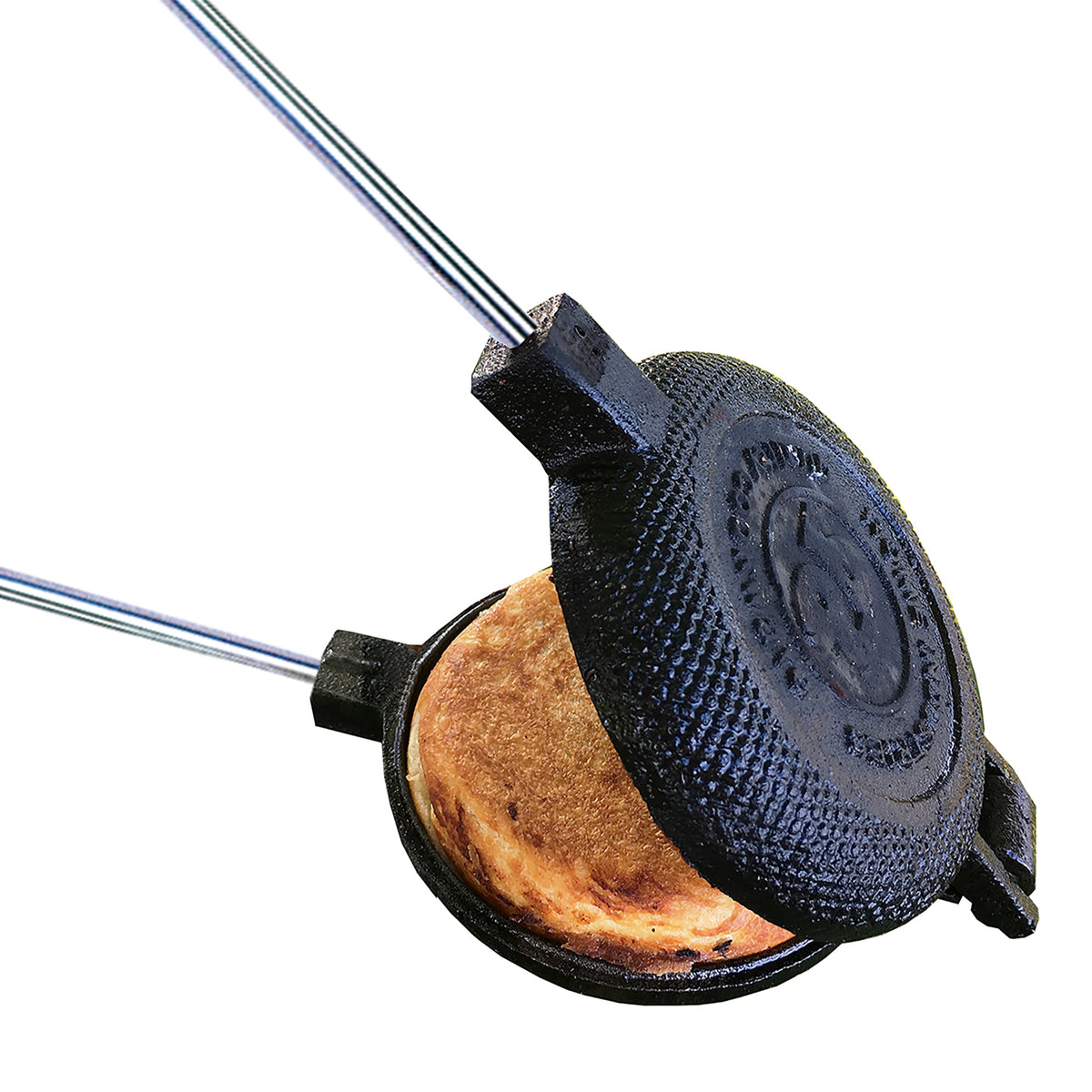 Round Pie Iron in use close up white background