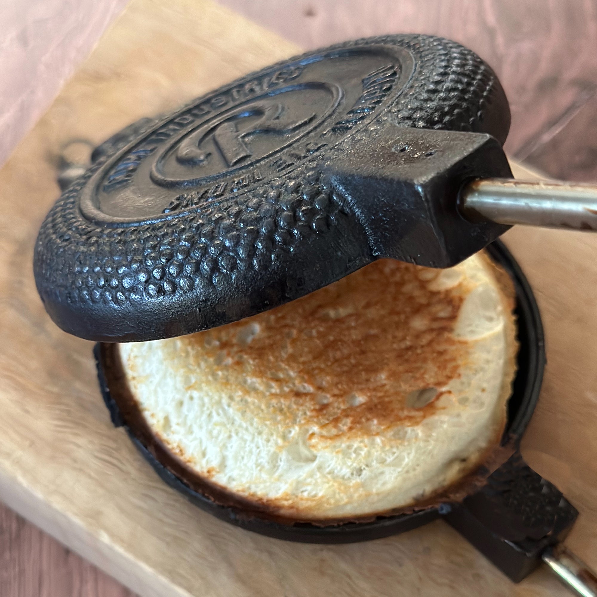 Round Pie Iron in use close up
