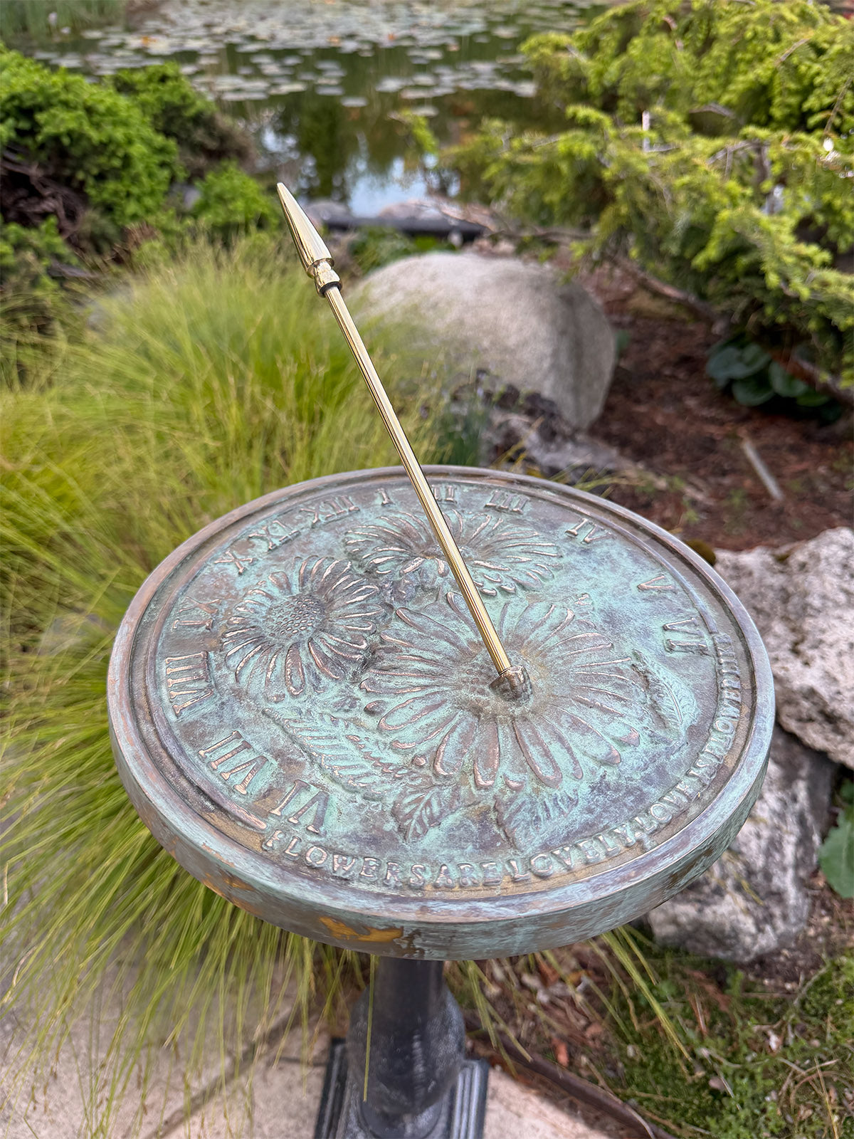 Solid Brass Flowers Sundial on pedestal close up