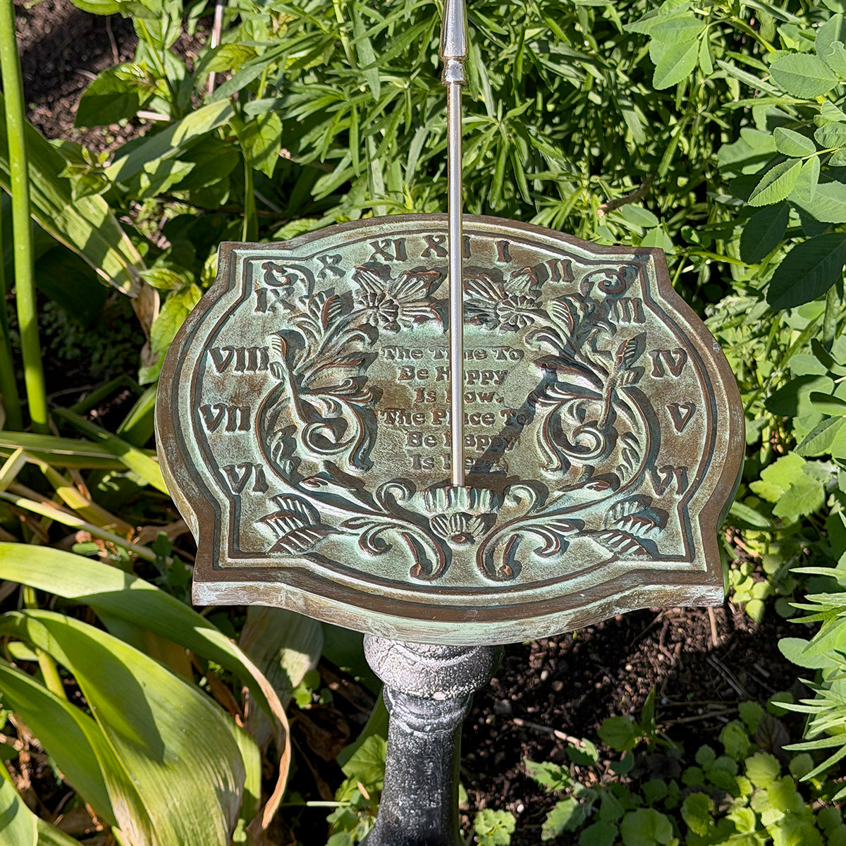 Solid Brass Happiness Sundial on pedestal in garden top view b