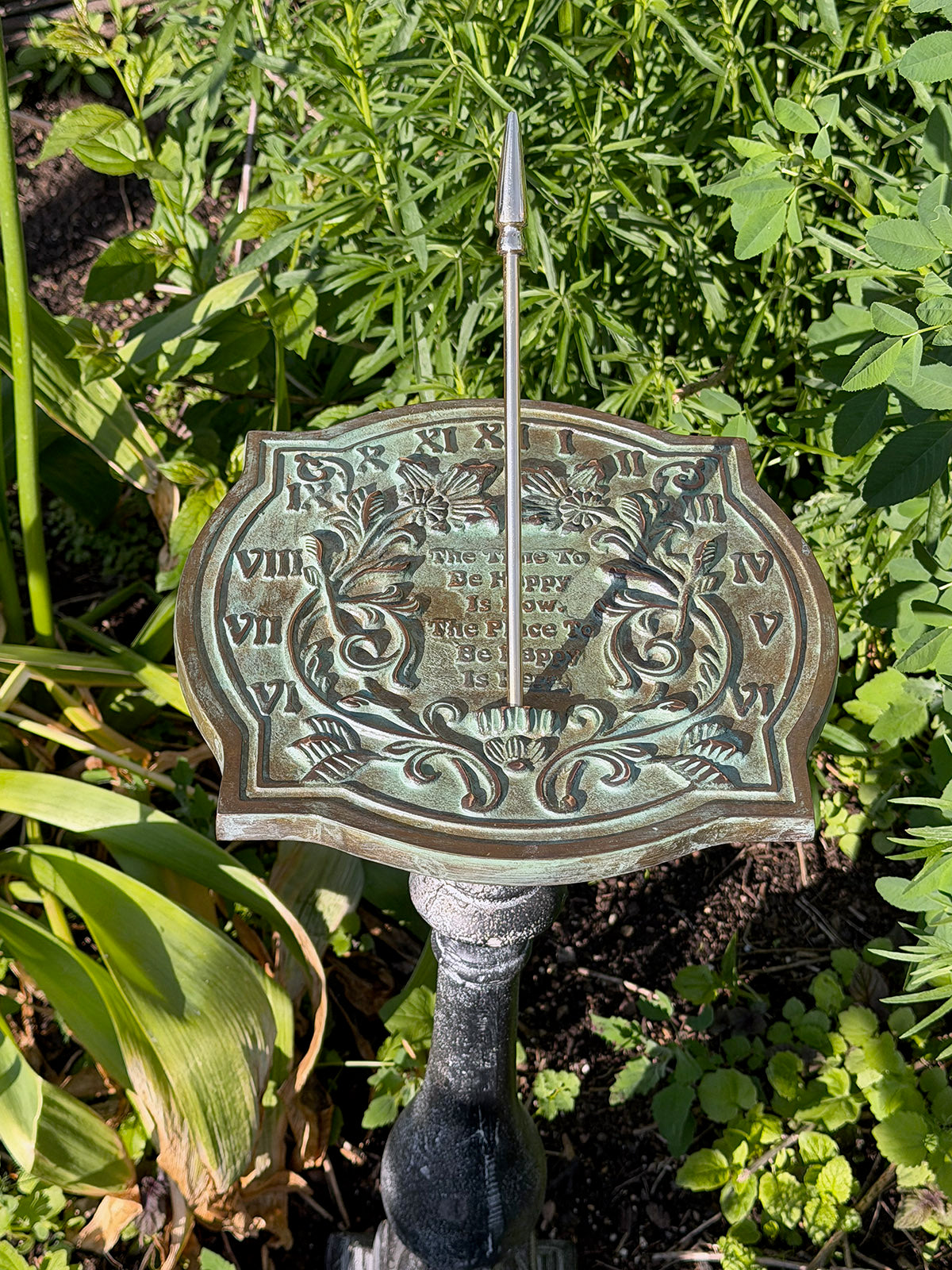 Solid Brass Happiness Sundial on pedestal in garden top view b
