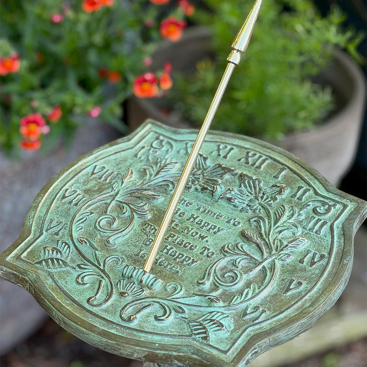 Solid Brass Happiness Sundial in garden top view b
