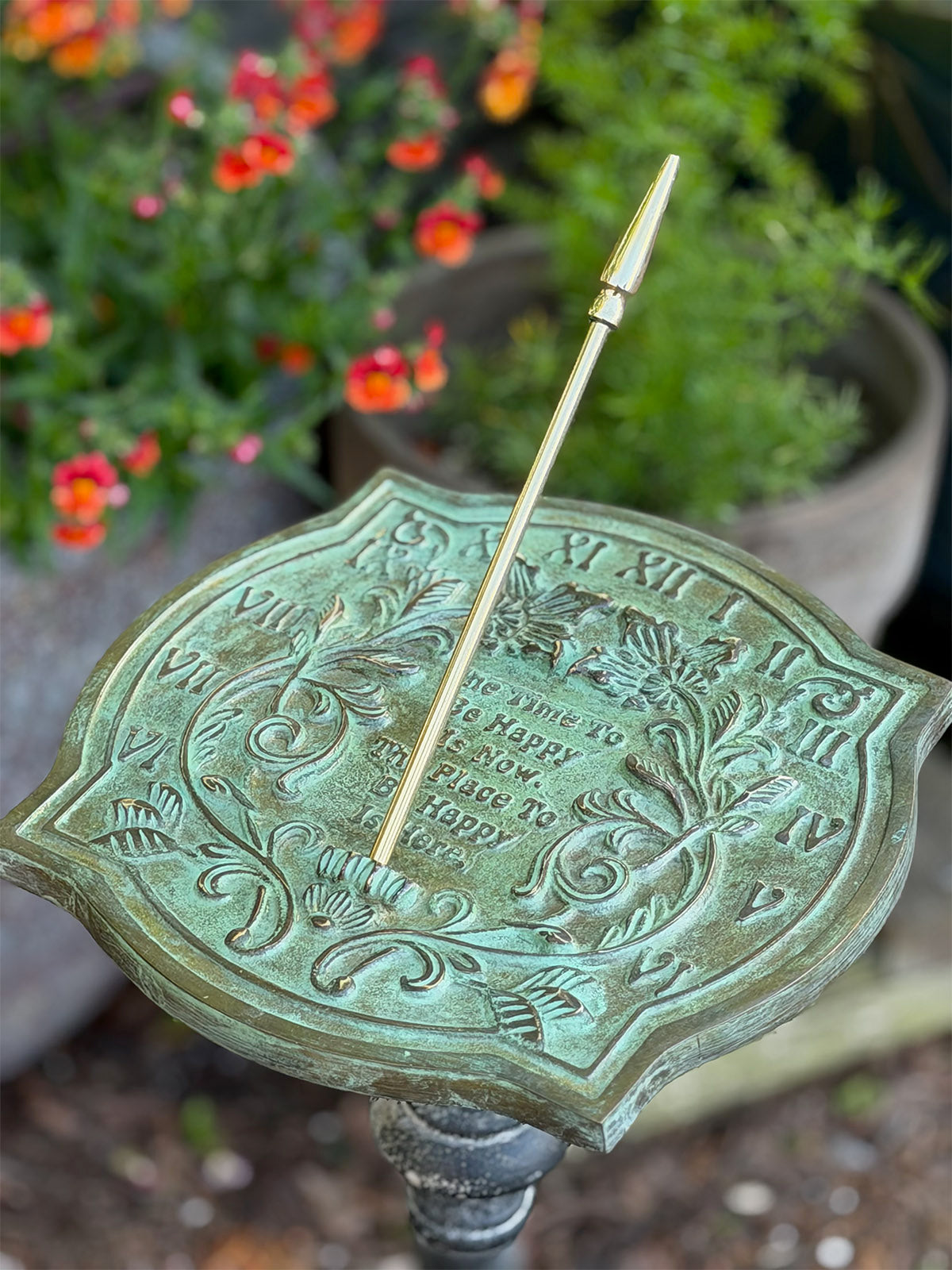 Solid Brass Happiness Sundial in garden top view b