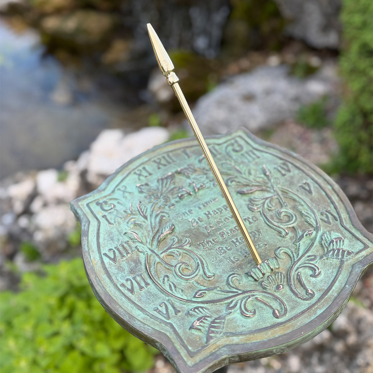 Solid Brass Happiness Sundial in garden top view c