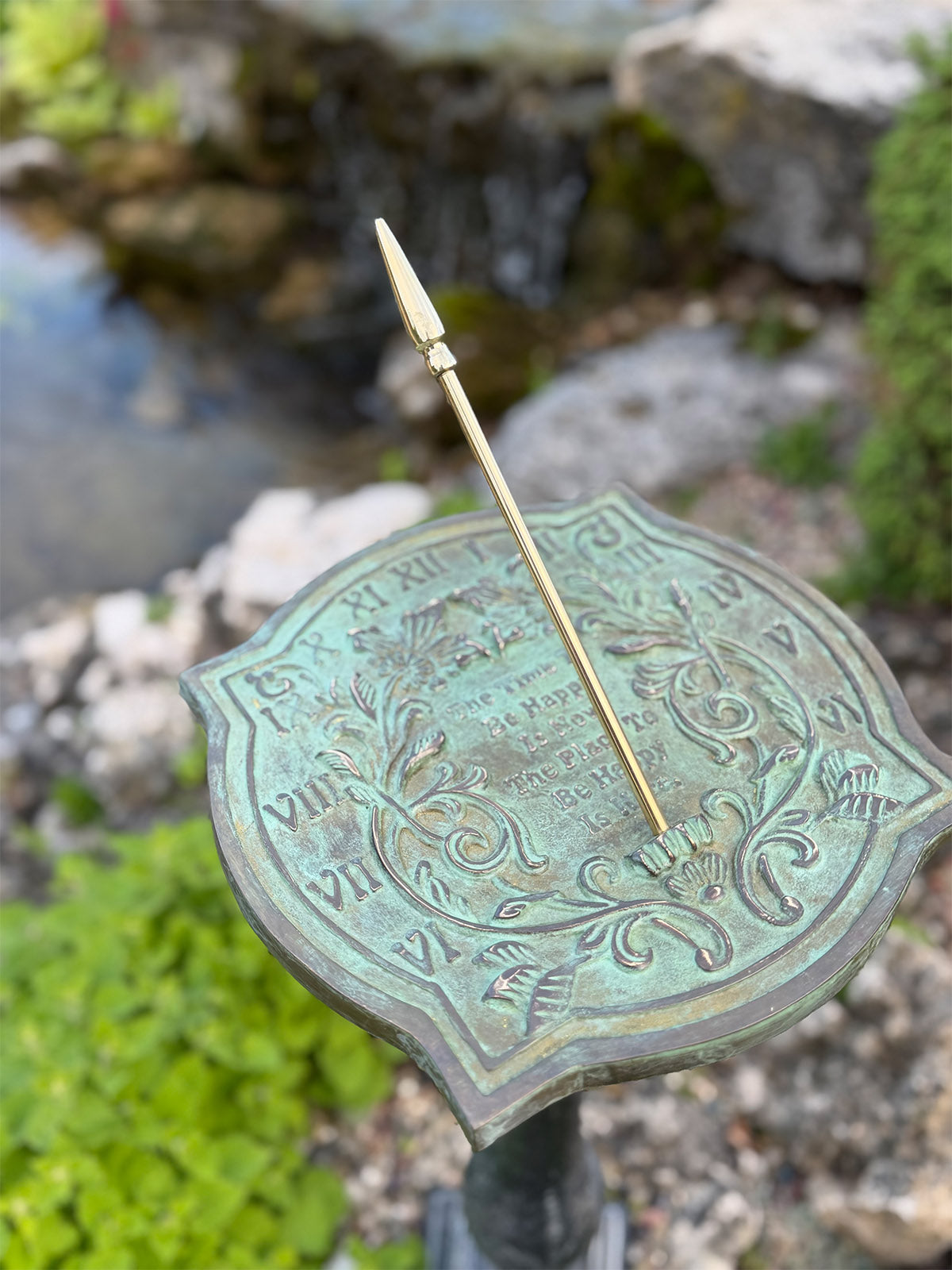 Solid Brass Happiness Sundial in garden top view c