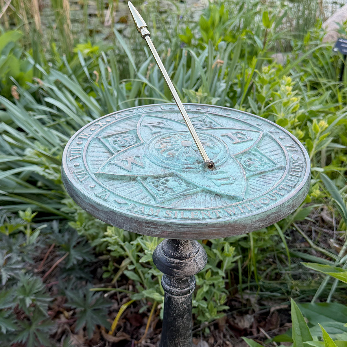 Solid Brass Rosette Sundial on pedestal in garden