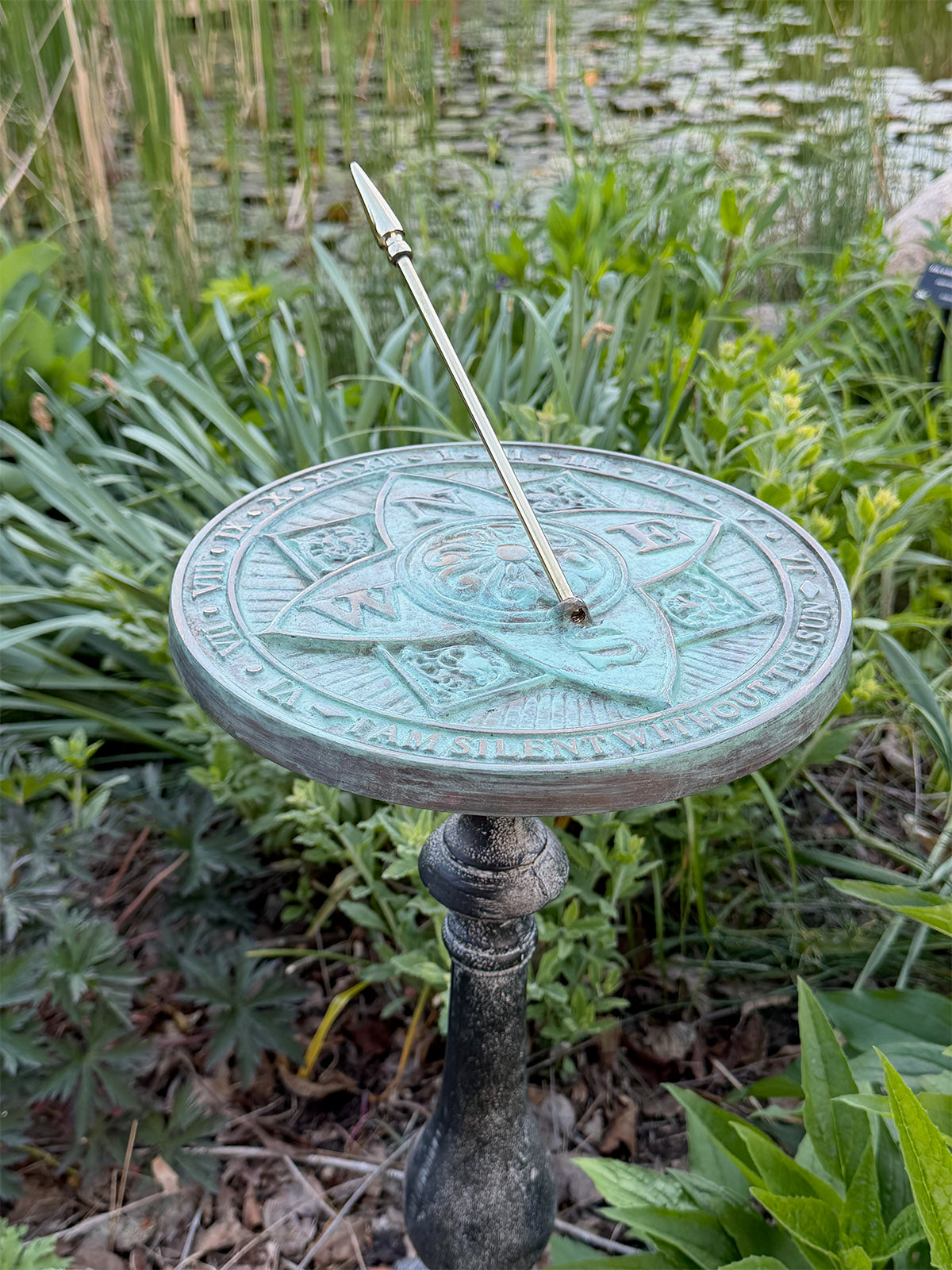 Solid Brass Rosette Sundial on pedestal in garden