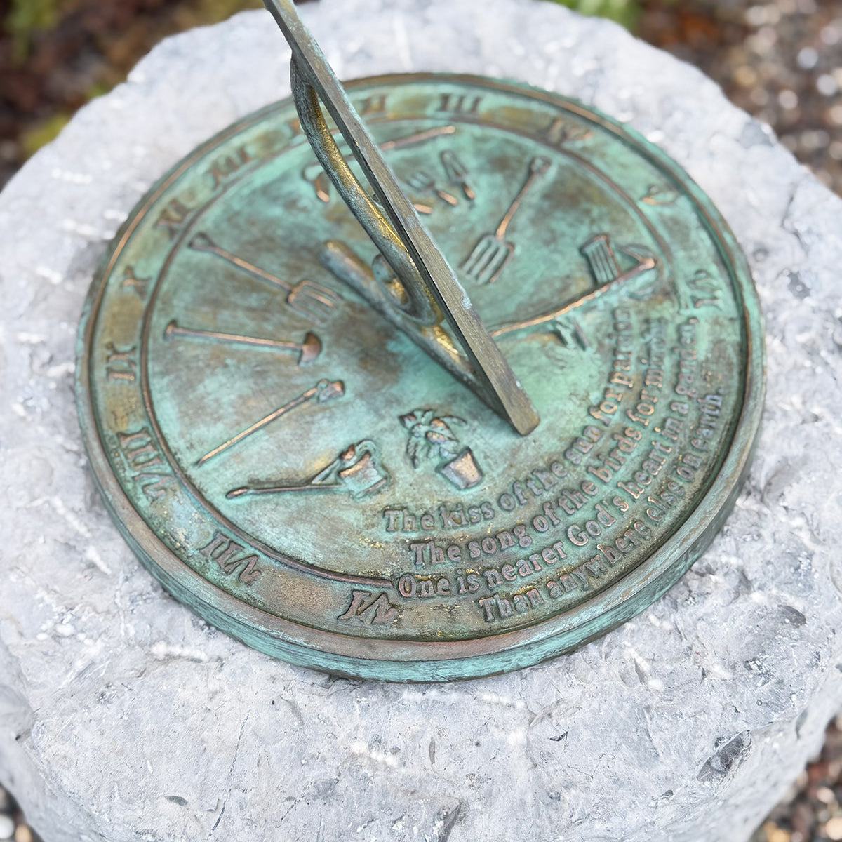 Solid Brass Kiss Of The Sun Sundial in garden top view c