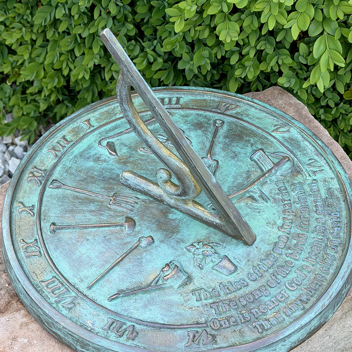 Solid Brass Kiss Of The Sun Sundial in garden top view