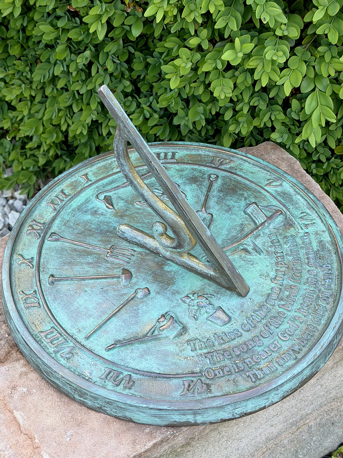Solid Brass Kiss Of The Sun Sundial in garden top view