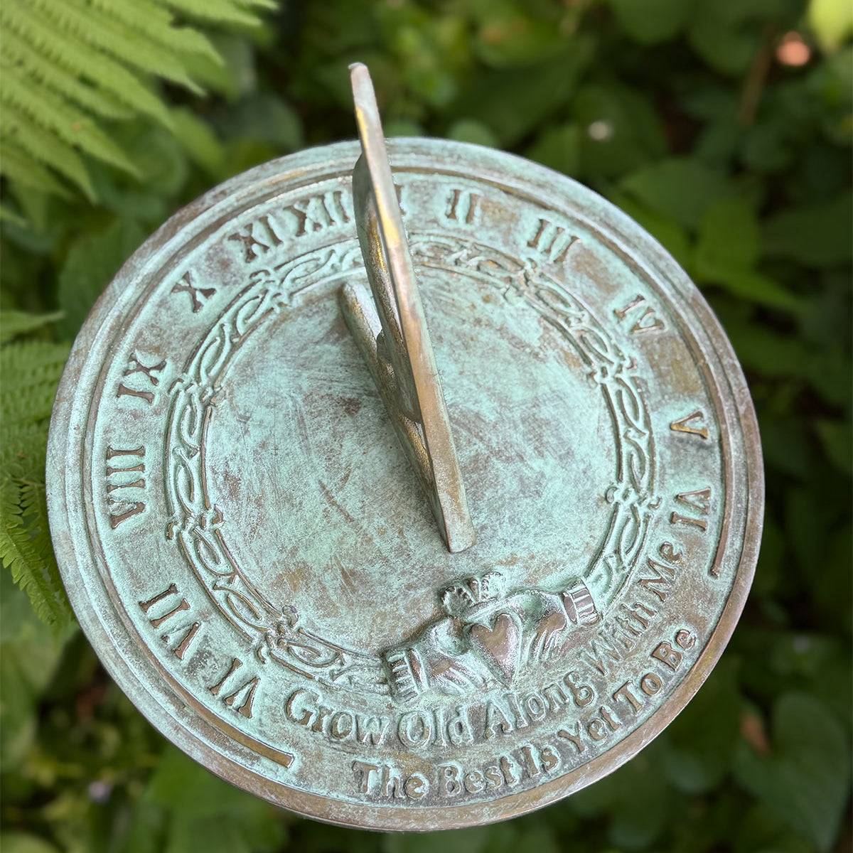 Solid Brass Grow Old With Me Sundial in garden top view