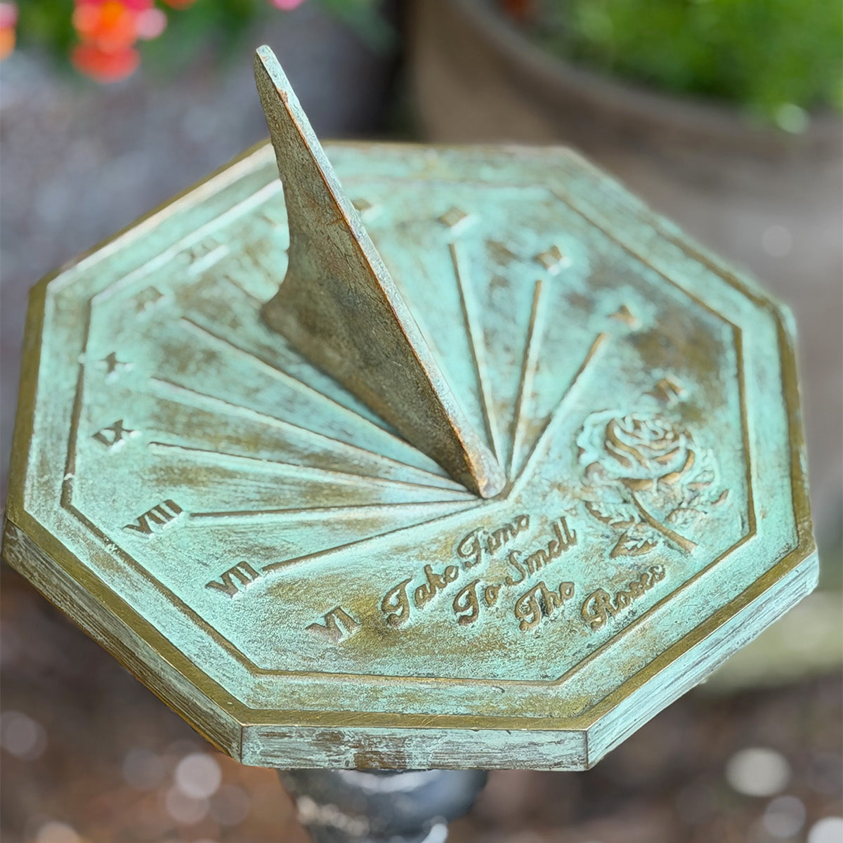 Solid Brass Rose Sundial in garden