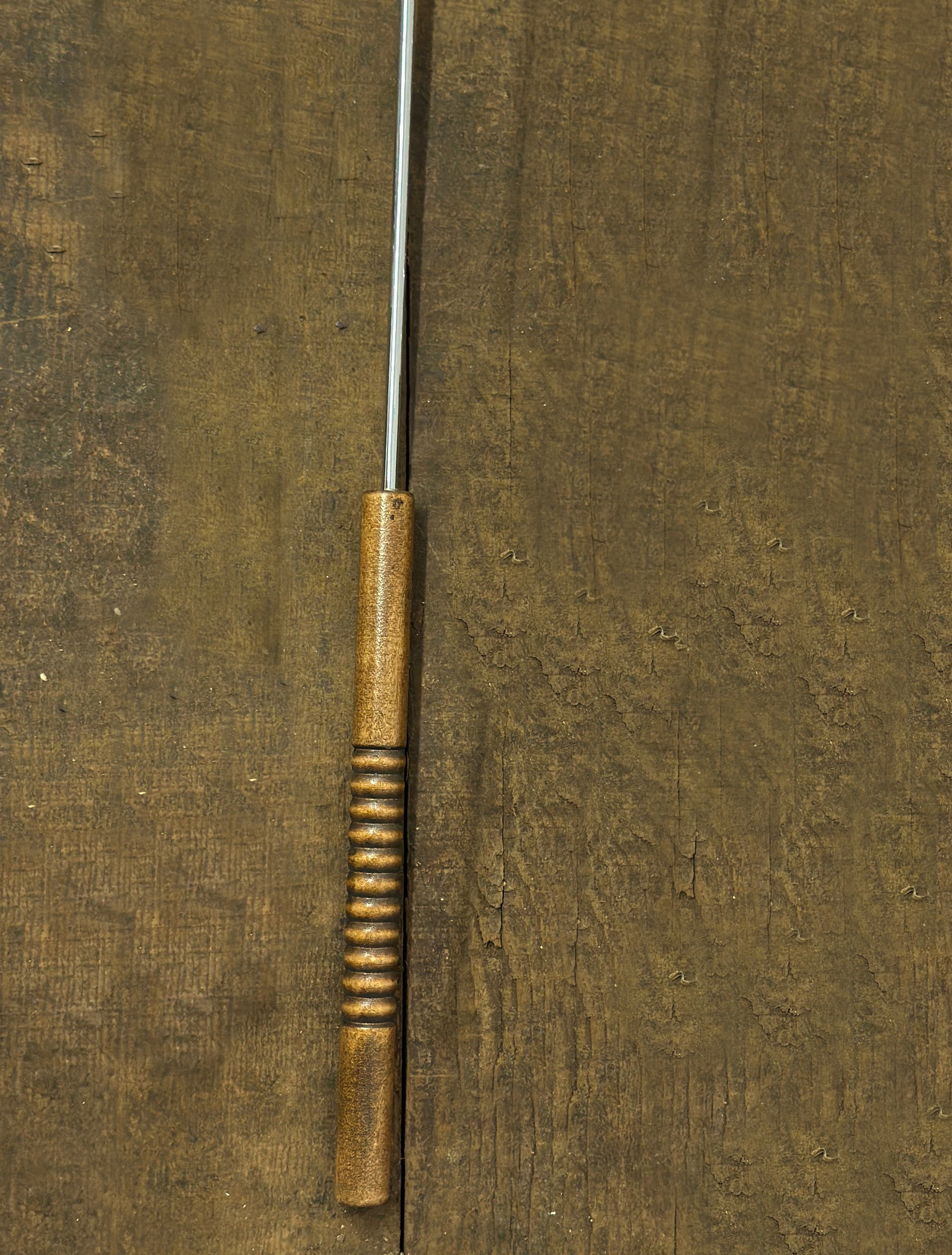 Hot Dog Roasting Fork handle close up vertical
